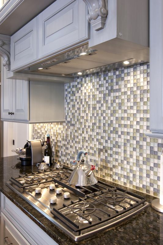 Kitchen backsplash with mosaic tiles