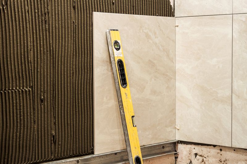 Living room with tiled accent wall